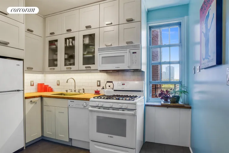 New York City Real Estate | View 360 Clinton Avenue, 5J | Windowed kitchen w/ great cabinet space | View 3