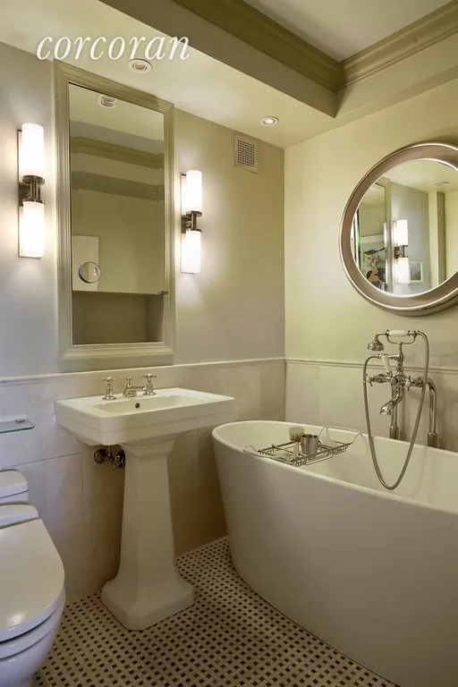 New York City Real Estate | View 196 East 75th Street, 16E | Master Bathroom | View 5