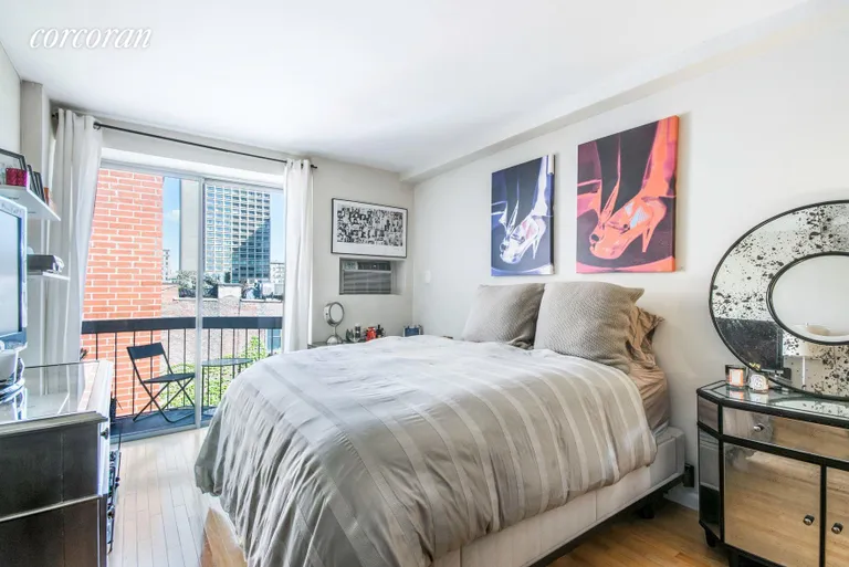 New York City Real Estate | View 184 Thompson Street, 6A | Bedroom with Private Balcony | View 4