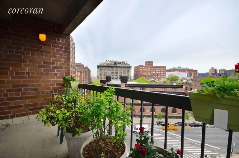 New York City Real Estate | View 63 Downing Street, 7A | Sun Drenched Balcony with city views!  | View 2