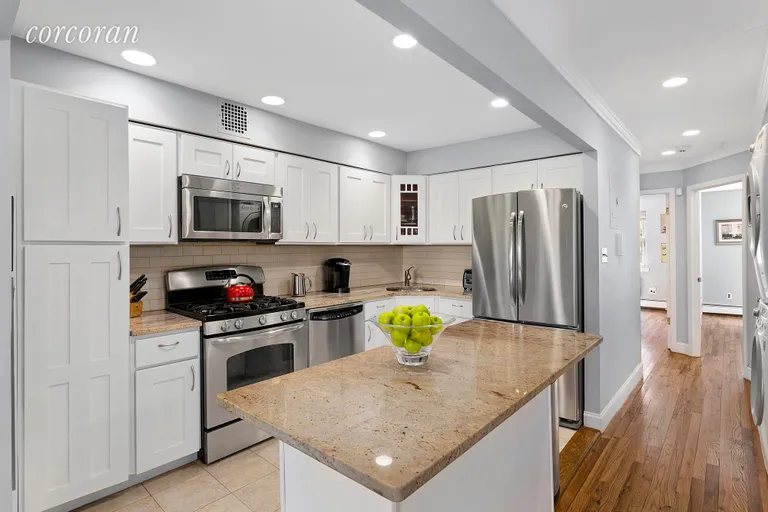 New York City Real Estate | View 164 Huntington Street, A | Bright white kitchen | View 3