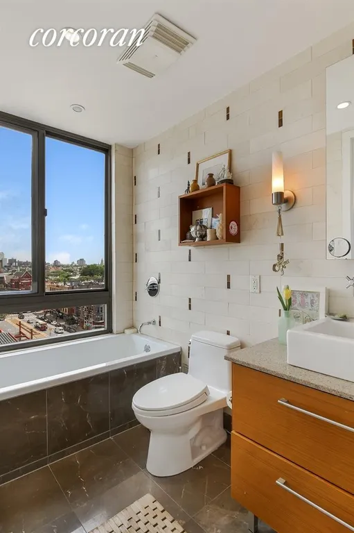 New York City Real Estate | View 500 4th Avenue, 9B | Master Bathroom and Tub with Views | View 6