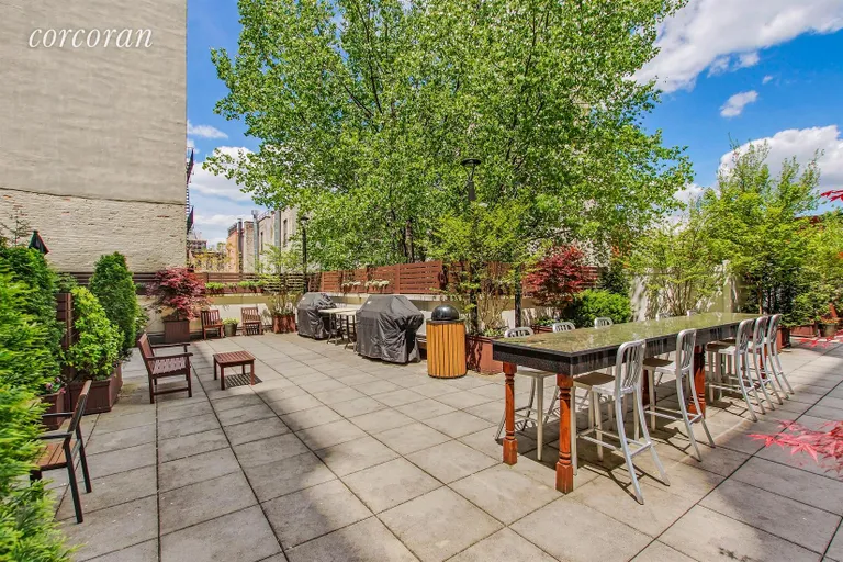 New York City Real Estate | View 301 West 115th Street, 6B | Common Patio with BBQ | View 6