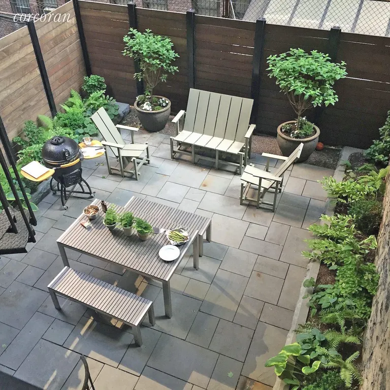 New York City Real Estate | View 232 East 50th Street, 1 | Private Garden | View 2