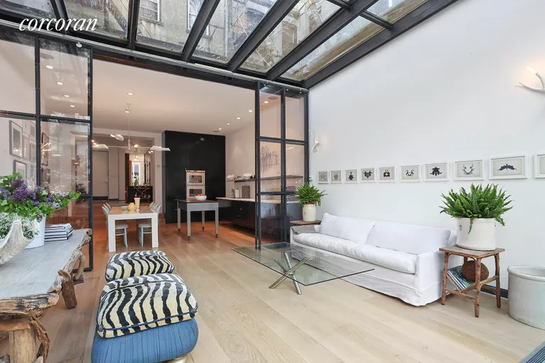 New York City Real Estate | View 79 Saint Marks Place | Glass extension with retractable doors | View 2
