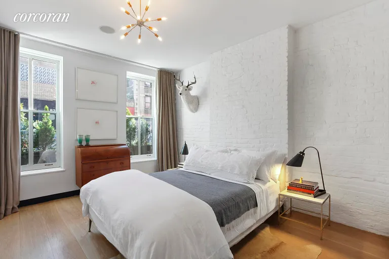 New York City Real Estate | View 79 Saint Marks Place | First floor bedroom | View 5