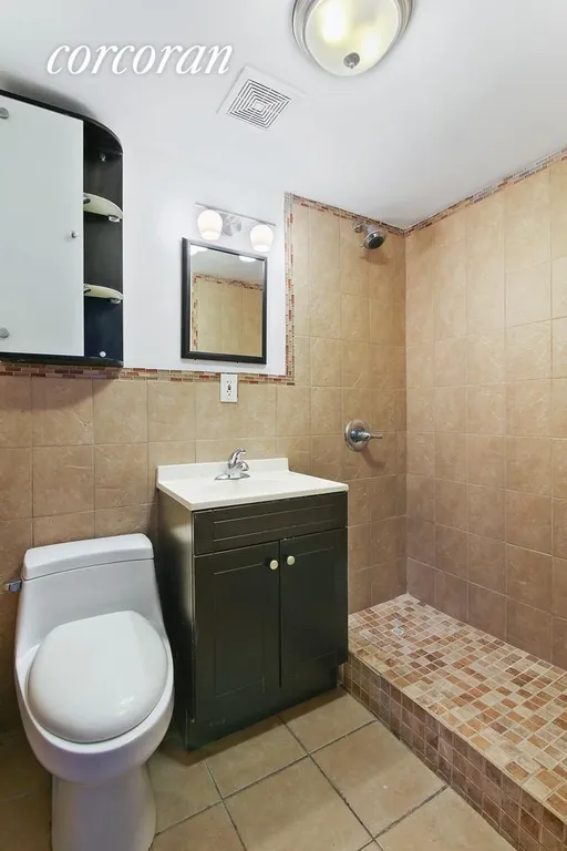 New York City Real Estate | View 1607 Bergen Street, 1 | Renovated Bath w/Tiled Stall Shower | View 6