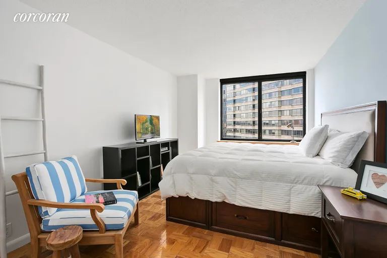 New York City Real Estate | View 415 East 37th Street, 22N | Large Master Bedroom with East River Views | View 4