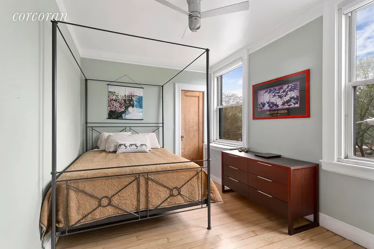 New York City Real Estate | View 243 Riverside Drive, 303 | Bedroom with Tree-Top Views | View 2