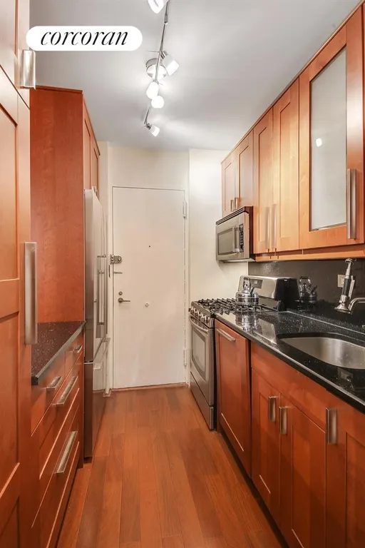 New York City Real Estate | View 400 East 56th Street, 29E | Renovated Kitchen with Granite Counters | View 3