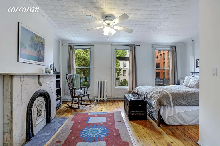 New York City Real Estate | View 230 11th Street | Master Bedroom With Decorative Fireplace  | View 6