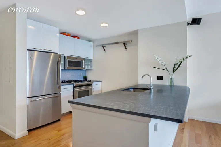 New York City Real Estate | View 48-21 5th Street, 4I | Pietra Cardosa countertops & high-end appliances | View 2