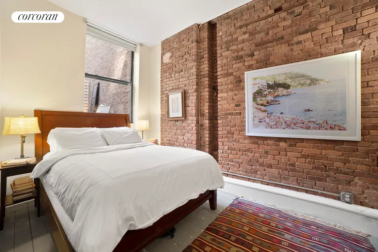 New York City Real Estate | View 148 Mercer Street, 3 FL | Bedroom with exposed brick | View 4