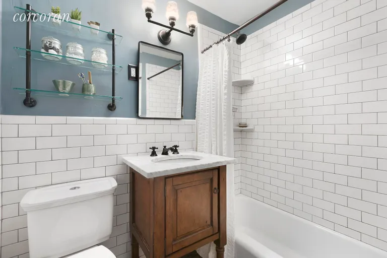 New York City Real Estate | View 195 Willoughby Avenue, 1601 | Tiled Bathroom | View 6