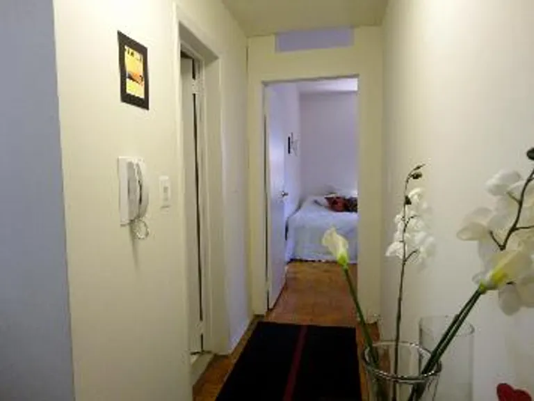 New York City Real Estate | View 50 West 34th Street, 19A6 | Hallway from Foyer to living area (bathroom on lef | View 3