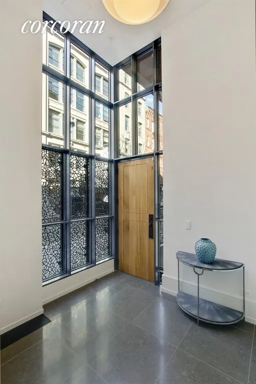 New York City Real Estate | View 215 Sullivan Street, THC | Double Height Entry Foyer | View 8