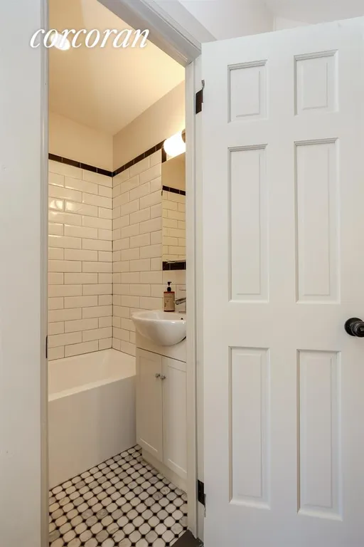 New York City Real Estate | View 397 Rogers Avenue | Renovated Bathrooms | View 8