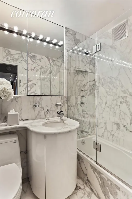 New York City Real Estate | View 345 East 73rd Street, 4J | Elegantly renovated, marble Bathroom | View 6