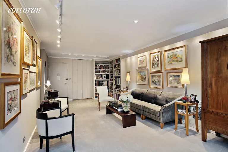 New York City Real Estate | View 345 East 73rd Street, 4J | Huge Living Room w/corner bookcases | View 5
