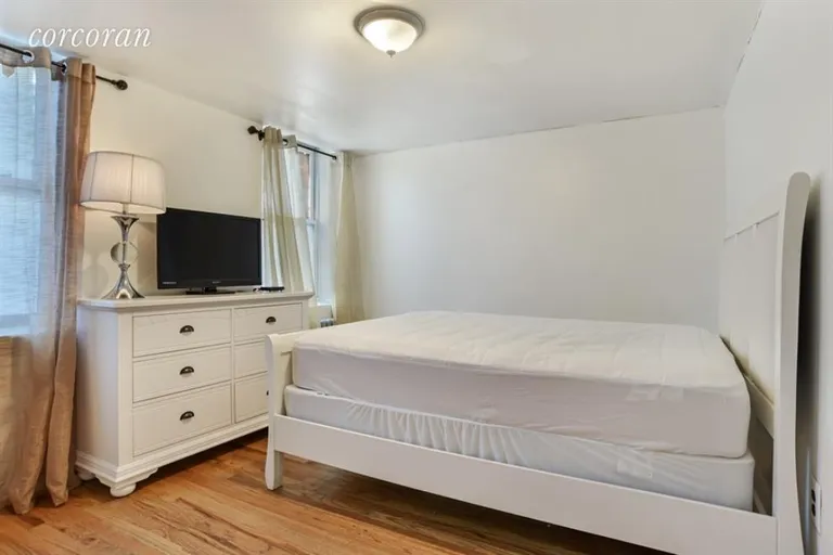 New York City Real Estate | View 192 Madison Street, 1-F | Bedroom Garden-Front | View 5