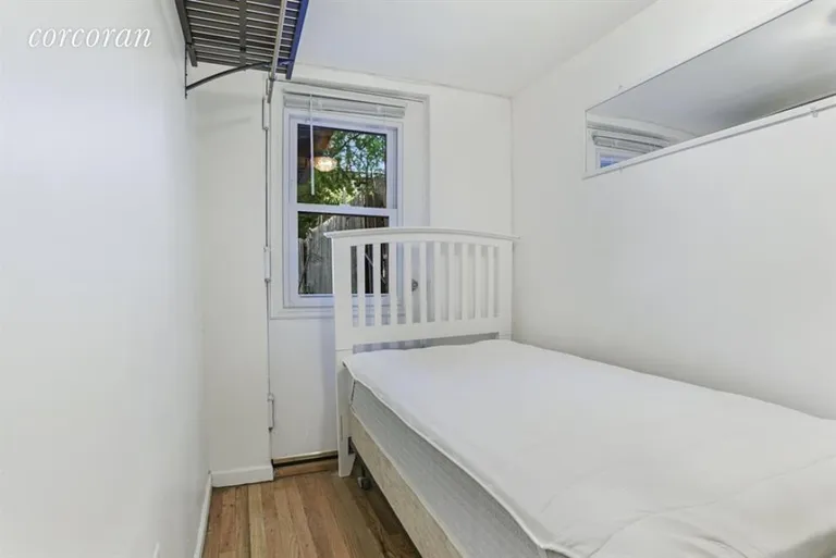 New York City Real Estate | View 192 Madison Street, 1-F | Bedroom Garden Rear | View 6
