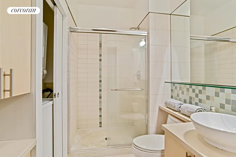 New York City Real Estate | View 543 Dean Street, 3 | Hall bath with laundry closet | View 8