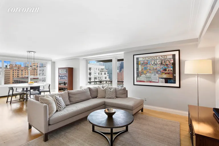New York City Real Estate | View 200 East 66th Street, E15-02 | Living room with double exposure | View 2
