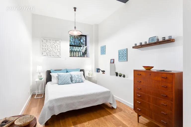 New York City Real Estate | View 46 Butler Street, LL | Spacious Master Bedroom has en-suite Bath  | View 4