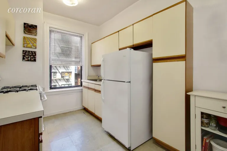 New York City Real Estate | View 222 East 82nd Street, 4D | Large Kitchen with Northern Exposure | View 3