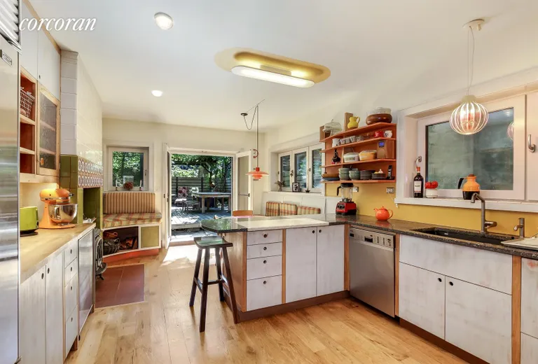 New York City Real Estate | View 353 Carlton Avenue, 1-2 | Chef's kitchen leading out on to the decked garden | View 3
