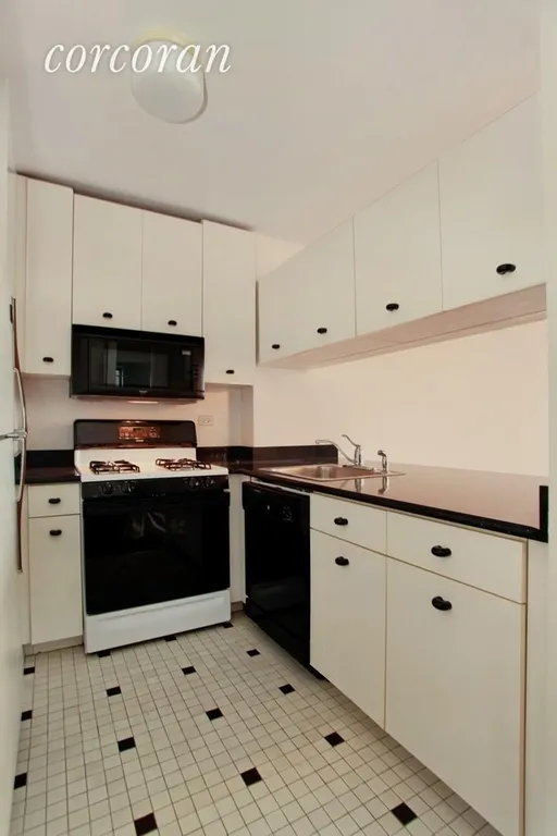 New York City Real Estate | View 45 East 25th Street, 40A | White Pass-through Kitchen! | View 3