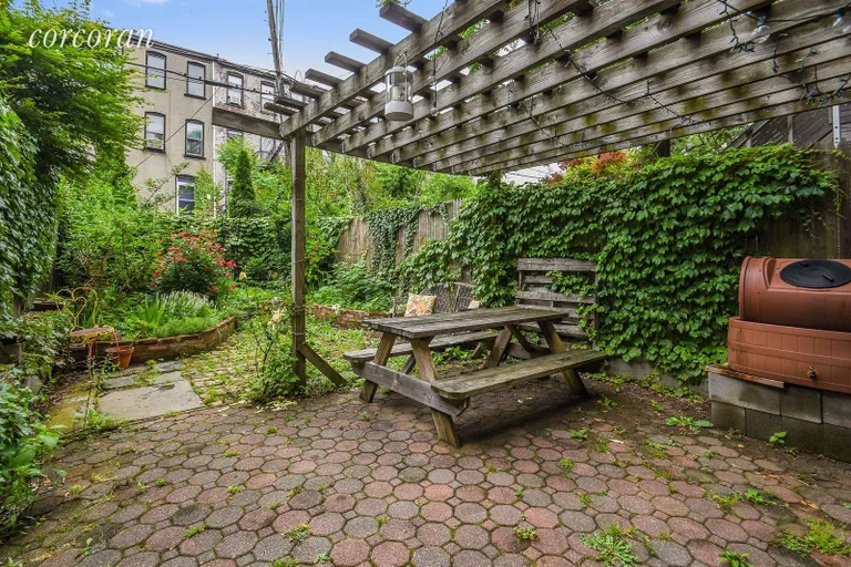 New York City Real Estate | View 582 Jefferson Avenue | Quaint garden retreat with charming pergola | View 10