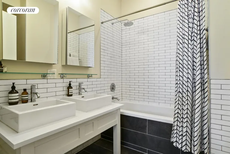 New York City Real Estate | View 270 Saint Marks Avenue, 2 | Master bathroom with dual sinks + deep soaking tub | View 5