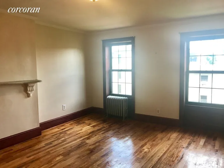 New York City Real Estate | View 371A Gates Avenue, 2 | Bedroom with a pretty marble mantel | View 9