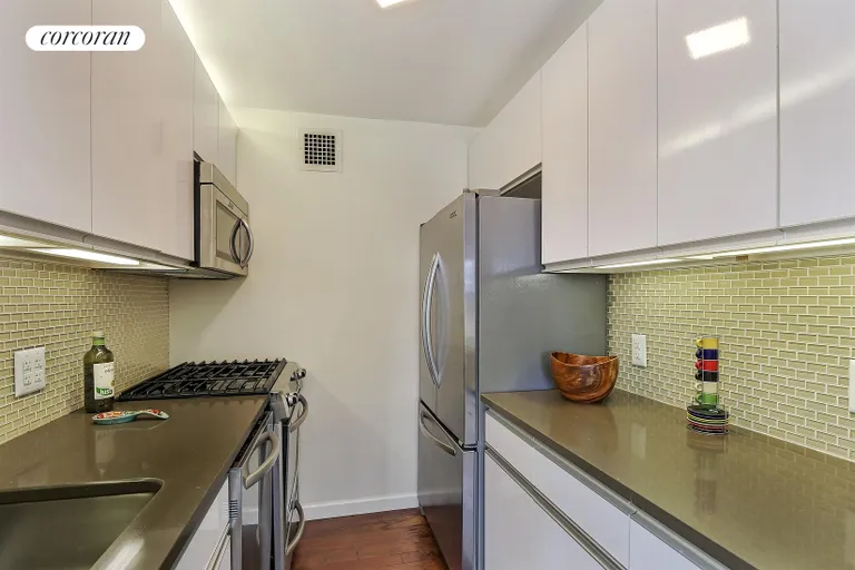 New York City Real Estate | View 100 West 93rd Street, 23A | Cook's kitchen with stainless appliances | View 4