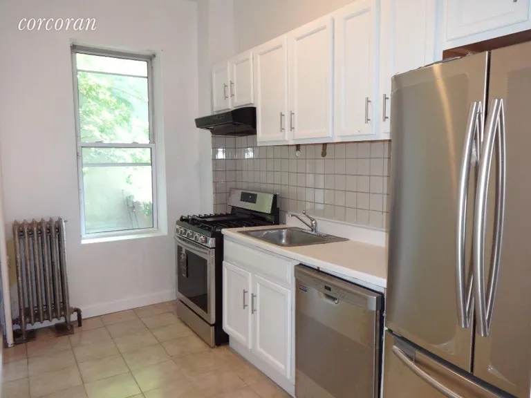 New York City Real Estate | View 382 Chauncey Street, 1 | Window and Stainless Steel Appliances | View 5