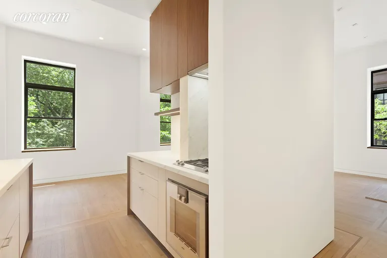 New York City Real Estate | View 7 GRAMERCY PARK WEST, 2-C | Park Views from Top of the Line Kitchen and Dining | View 4