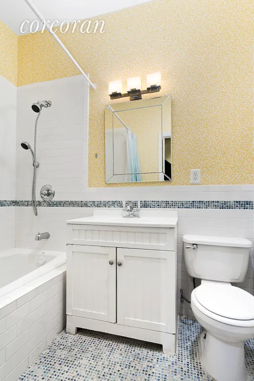 New York City Real Estate | View 677 Greene Avenue | Bathroom with Custom Inlaid Tile Design  | View 8