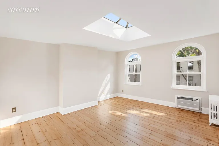 New York City Real Estate | View 6 Verandah Place | Charming Master BR has arched windows, Skylight | View 8