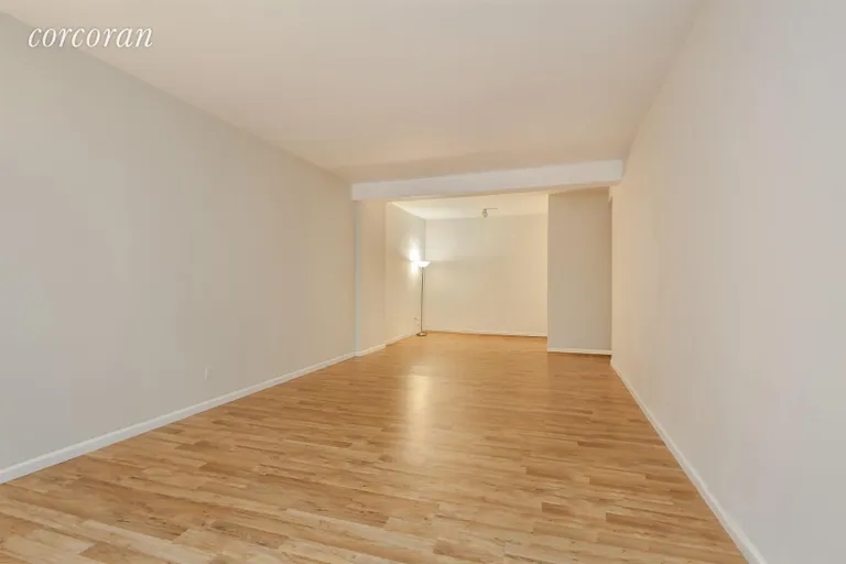 New York City Real Estate | View 402 East 90th Street, 1C | Living Room Reverse View | View 2