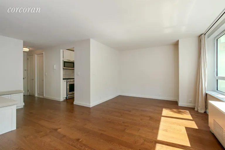 New York City Real Estate | View 200 East 94th Street, 305 | Living Room/Bedroom with a dining alcove | View 2