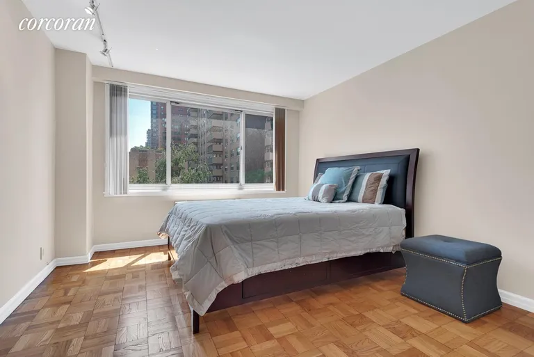 New York City Real Estate | View 401 East 86th Street, 7C | Sunny Master Bedroom with en-suite Bath | View 4