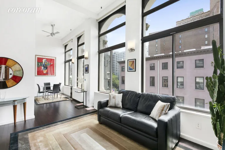 New York City Real Estate | View 67 East 11th Street, 521 | 4 oversized arched windows w prewar details | View 8