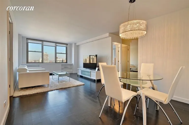 New York City Real Estate | View 301 East 79th Street, 36H | Living Room & Dining  Area New Floors | View 2