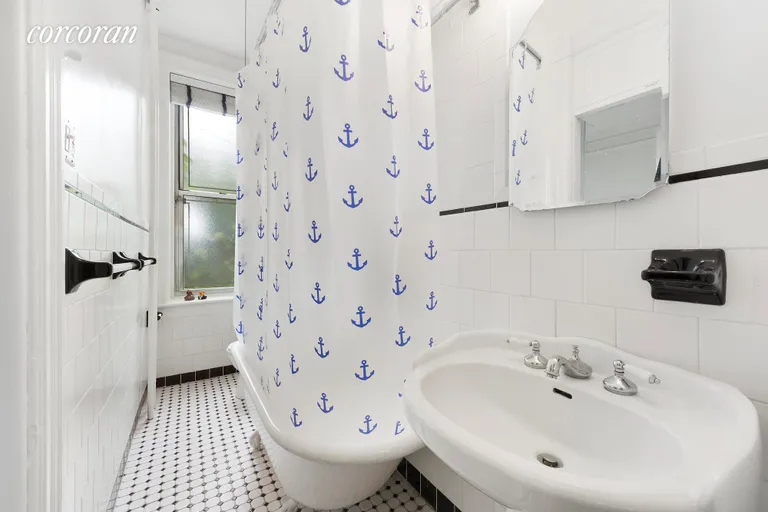 New York City Real Estate | View 331 West 19th Street, PARLOR | Windowed with a clawfoot tub | View 5