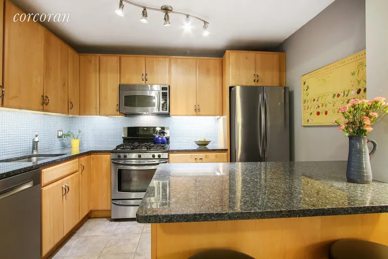 New York City Real Estate | View 599 East 7th Street, 4B | Luxurious kitchen with stainless steel appliances  | View 2