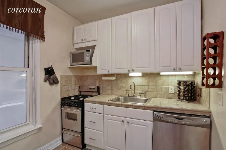New York City Real Estate | View 212 East 84th Street, 2D | Windowed eat-in kitchen. | View 3