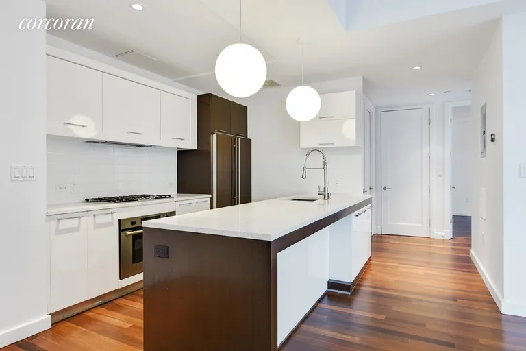 New York City Real Estate | View 125 North 10th Street, SOUTH4D | Large Breakfast Bar w/Stainless Steel Appliances | View 3