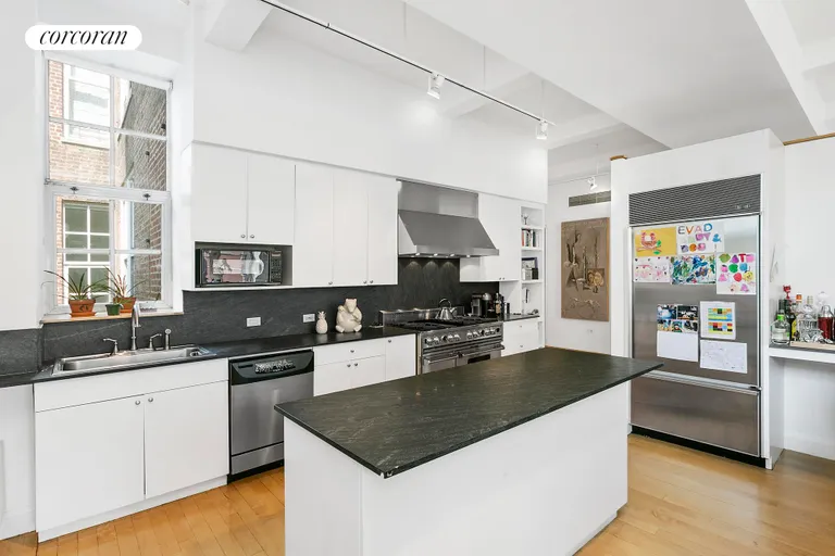New York City Real Estate | View 166 Duane Street, 6C | Expansive open, chef's kitchen | View 4
