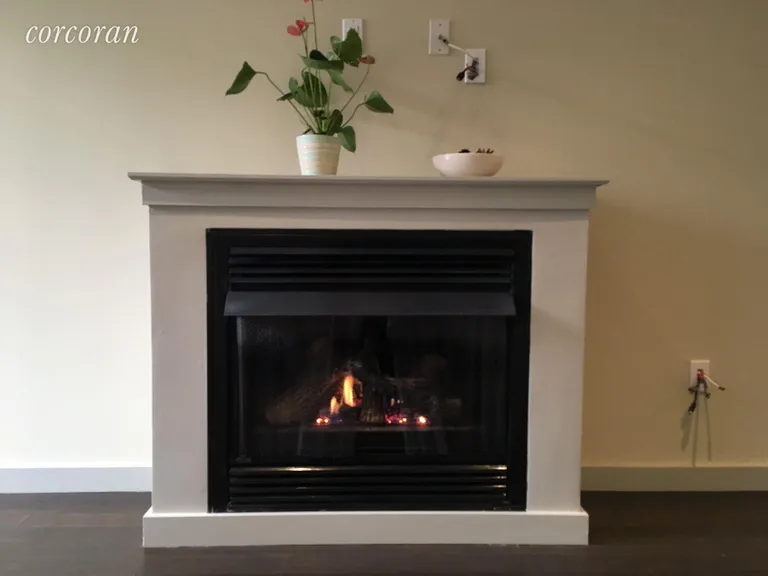 New York City Real Estate | View 10-40 46th Road, Garden B | Heat generating gas fireplace | View 9